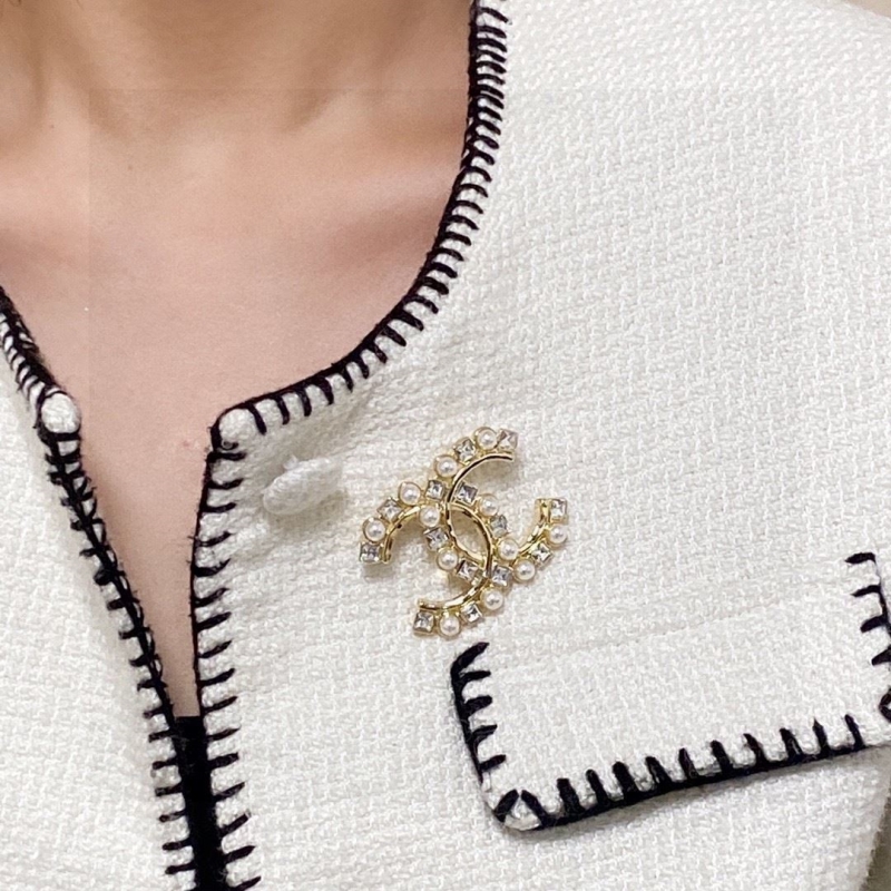 Ch*el brooches